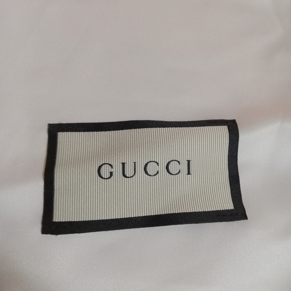 Gucci dust bags for shoes.